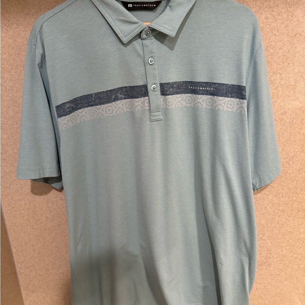 Travis Mathew Light Sage Polo with Navy Chest Stripe